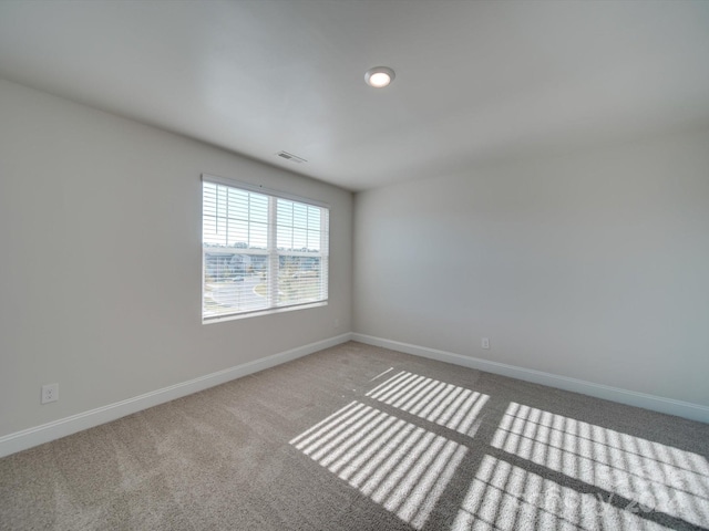 spare room with carpet flooring