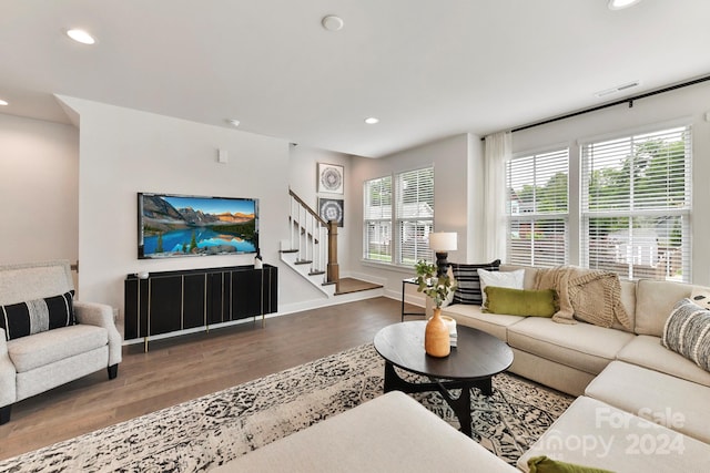 living room featuring hardwood / wood-style flooring and a wealth of natural light