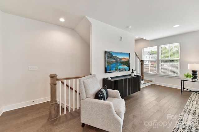 living room with dark hardwood / wood-style floors