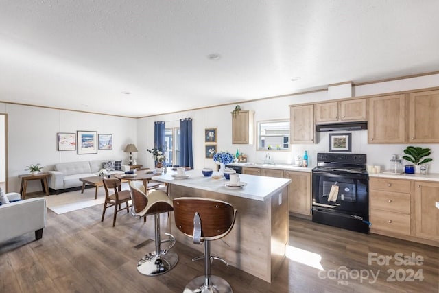 kitchen featuring light brown cabinets, black range with electric cooktop, dark hardwood / wood-style floors, and a kitchen island