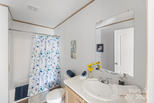 full bathroom featuring toilet, shower / bath combo, vanity, and ornamental molding