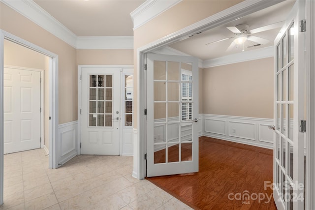 doorway to outside with french doors, ornamental molding, light wood-type flooring, and ceiling fan