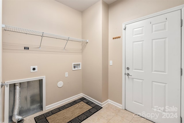 laundry room featuring hookup for an electric dryer, light tile patterned flooring, and washer hookup