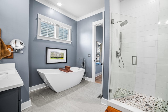 bathroom with vanity, crown molding, shower with separate bathtub, and tile patterned flooring