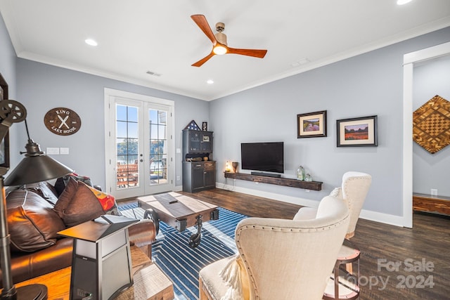 living room with french doors, ornamental molding, dark wood-type flooring, and ceiling fan