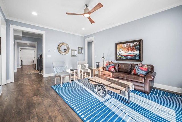 living room with dark wood-type flooring, ceiling fan, and ornamental molding