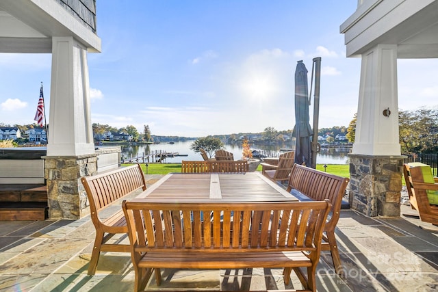 view of patio / terrace with a water view