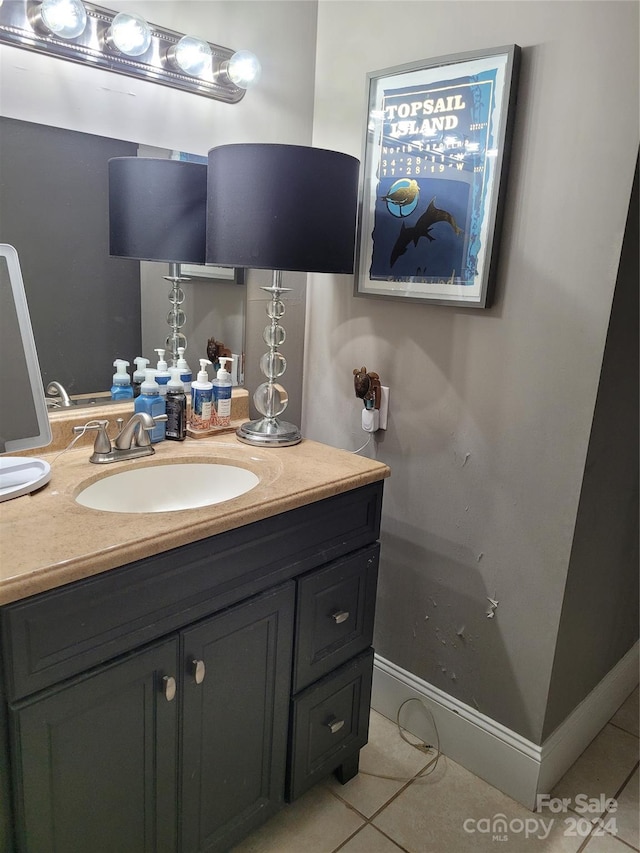 bathroom with vanity and tile patterned floors