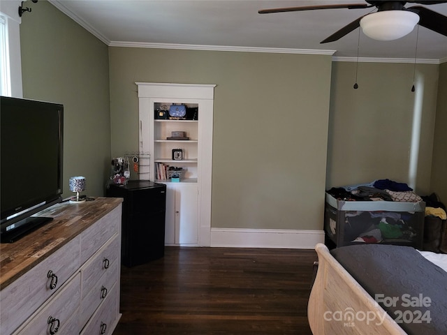 bedroom featuring dark wood-type flooring, ceiling fan, and crown molding