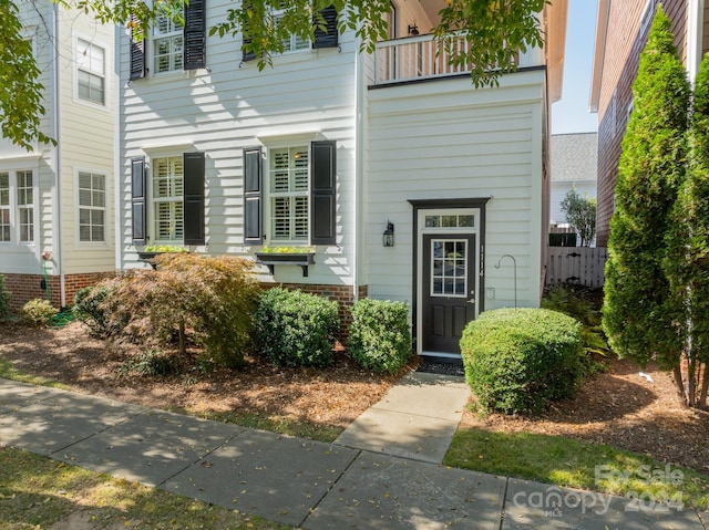 doorway to property with a balcony