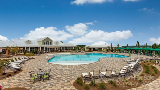 view of swimming pool featuring a patio