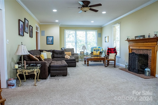 living room featuring crown molding, carpet, and a brick fireplace