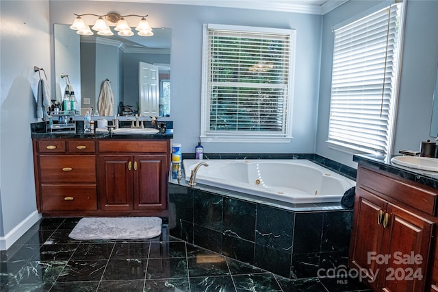 bathroom featuring vanity, crown molding, plenty of natural light, and tiled bath