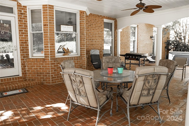 view of patio / terrace featuring ceiling fan