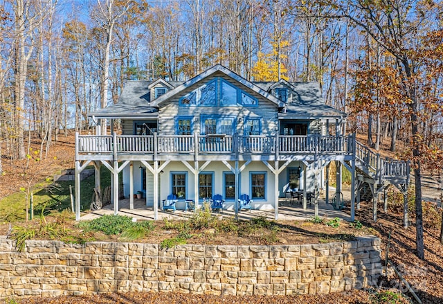 126 Bradley Ascent Ct, Hendersonville, NC 28792 - back of house featuring a patio, a wooden deck, stairs, and stucco siding