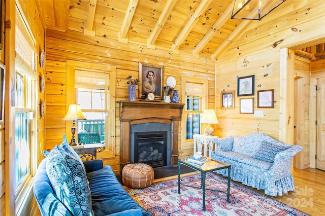 126 Bradley Ascent Ct, Hendersonville, NC 28792 - living area featuring wood ceiling, wood finished floors, wood walls, and a glass covered fireplace