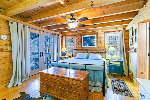 126 Bradley Ascent Ct, Hendersonville, NC 28792 - bedroom with wooden ceiling, wooden walls, light wood-type flooring, french doors, and beamed ceiling