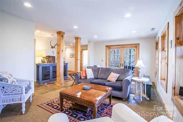126 Bradley Ascent Ct, Hendersonville, NC 28792 - living area featuring ornate columns, recessed lighting, carpet, and baseboards