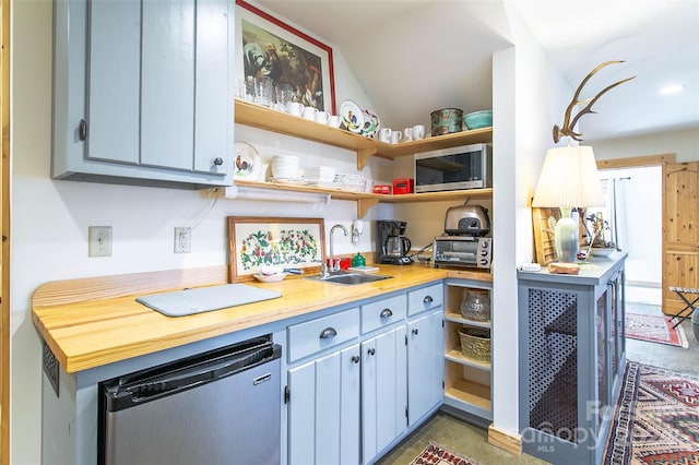 126 Bradley Ascent Ct, Hendersonville, NC 28792 - kitchen featuring a sink, fridge, stainless steel microwave, open shelves, and light countertops