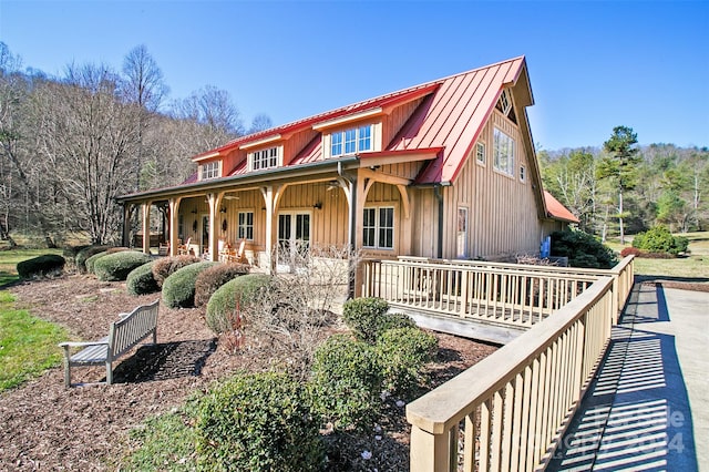 126 Bradley Ascent Ct, Hendersonville, NC 28792 - view of front facade with board and batten siding, a standing seam roof, and metal roof