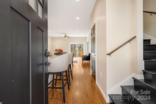 hall with light wood-type flooring