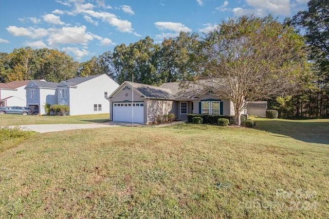 ranch-style home featuring a garage and a front lawn