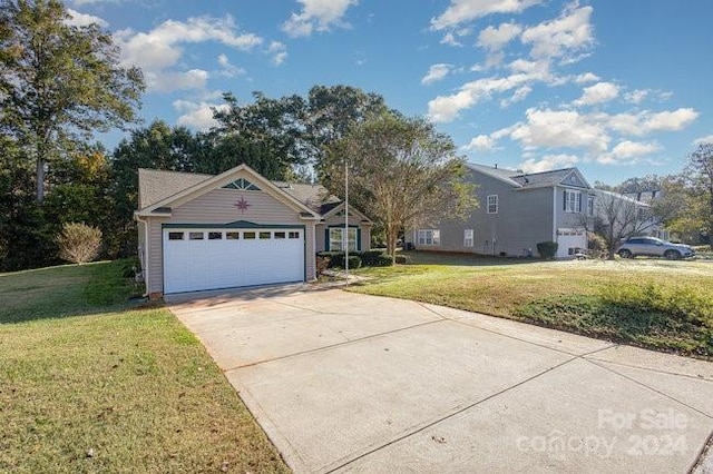 single story home with a front lawn and a garage