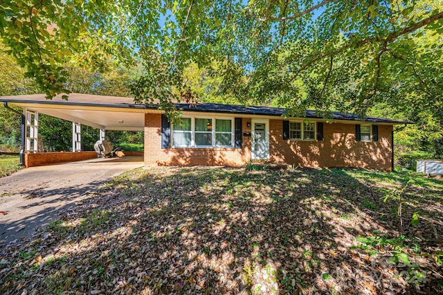 single story home with a carport