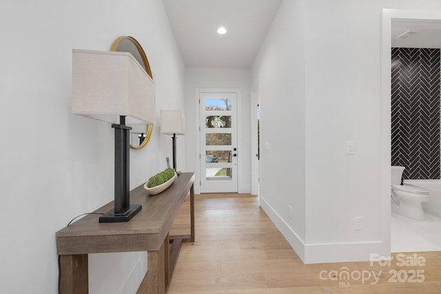 interior space with light hardwood / wood-style flooring