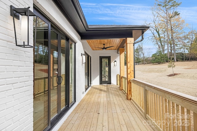 wooden deck with ceiling fan