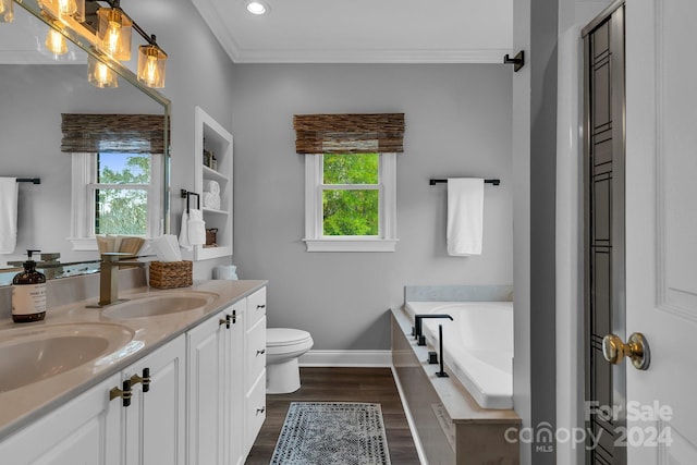 bathroom featuring tiled tub, plenty of natural light, wood-type flooring, and ornamental molding