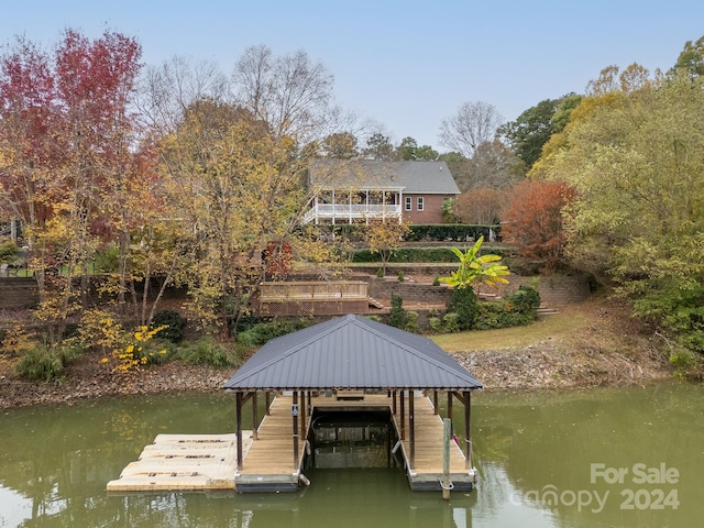 dock area featuring a water view