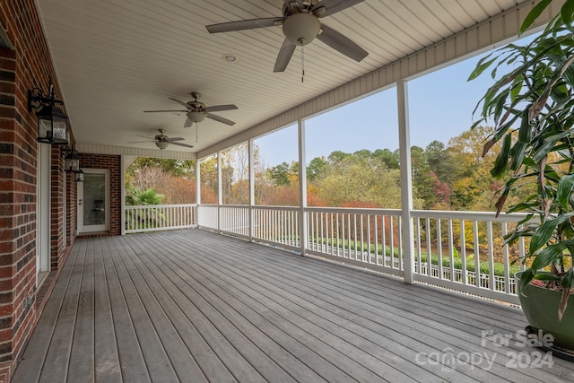 wooden deck with ceiling fan