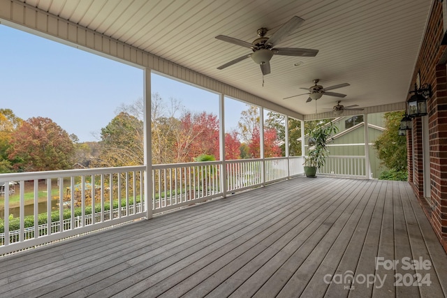 wooden deck with ceiling fan