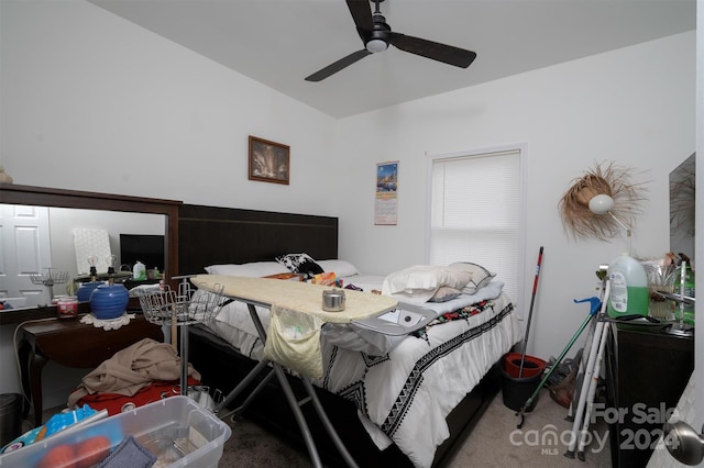 bedroom with ceiling fan and carpet floors