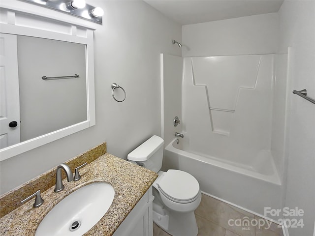 full bathroom with vanity, toilet, tile patterned flooring, and tub / shower combination