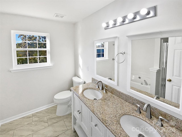 bathroom with vanity and toilet