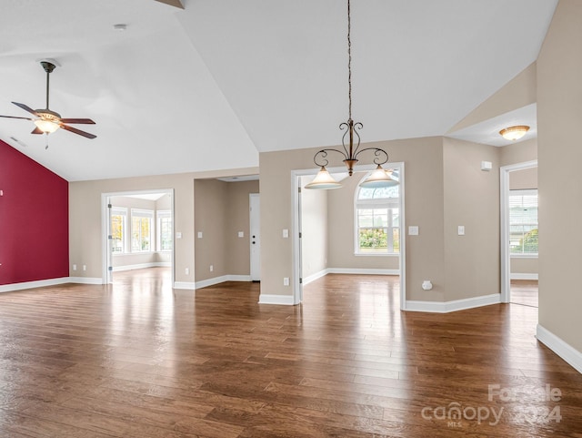 interior space featuring ceiling fan, plenty of natural light, and dark hardwood / wood-style flooring