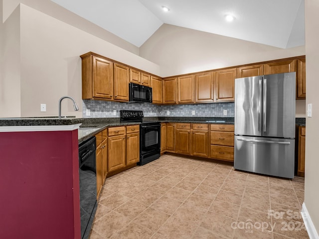 kitchen featuring backsplash, light tile patterned floors, black appliances, and high vaulted ceiling