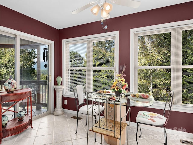 sunroom / solarium with ceiling fan