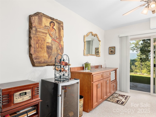 bathroom with vanity and ceiling fan