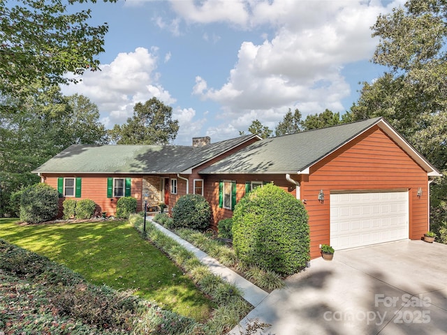 ranch-style home featuring a front yard and a garage