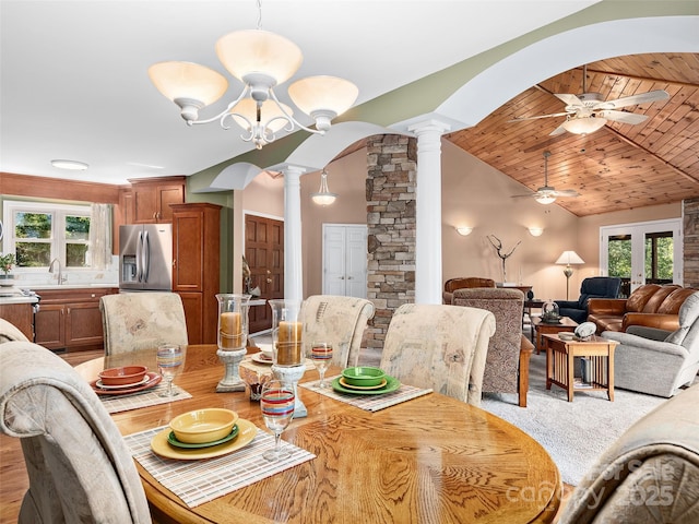 121 Canoe Dr, Mill Spring, NC 28756 - dining room featuring ceiling fan, decorative columns, wood ceiling, and lofted ceiling