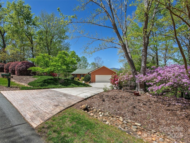 121 Canoe Dr, Mill Spring, NC 28756 - view of front of property with an attached garage and concrete driveway