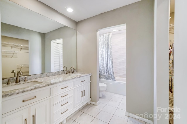 full bathroom with tile patterned floors, vanity, shower / bath combination with curtain, and toilet