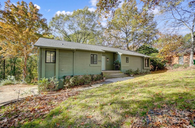 ranch-style home with a front yard