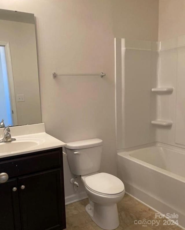 full bathroom featuring vanity, toilet, tile patterned floors, and shower / bathing tub combination