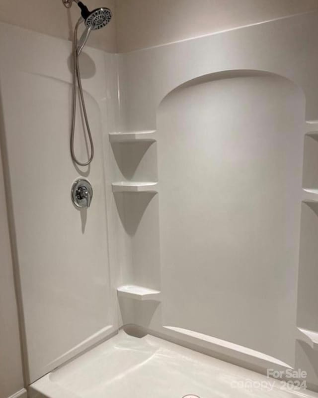 bathroom with a shower