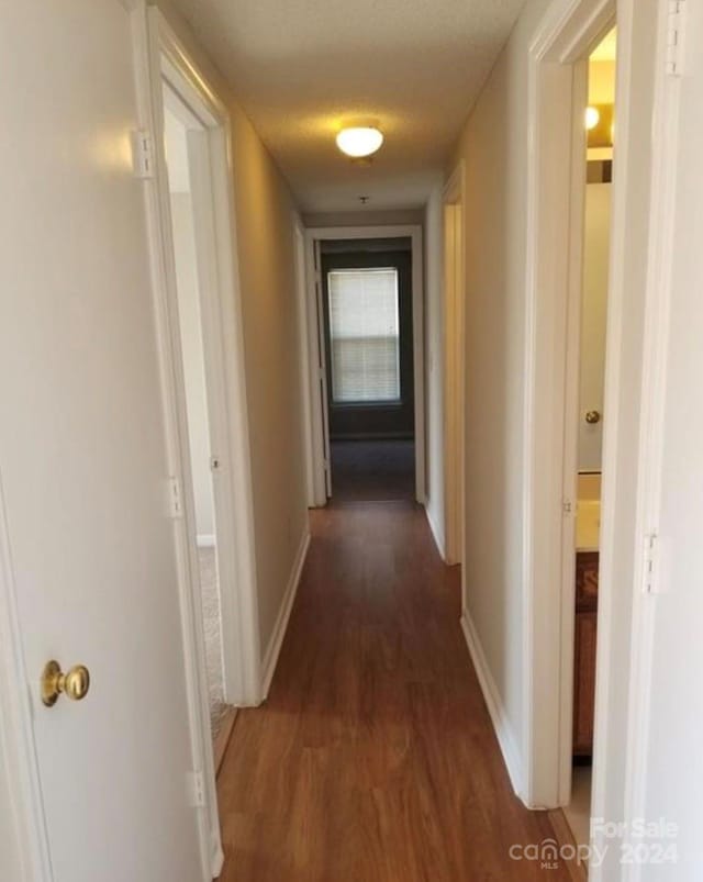 hall featuring dark hardwood / wood-style flooring