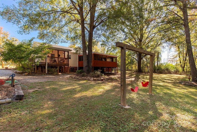 view of yard with a wooden deck